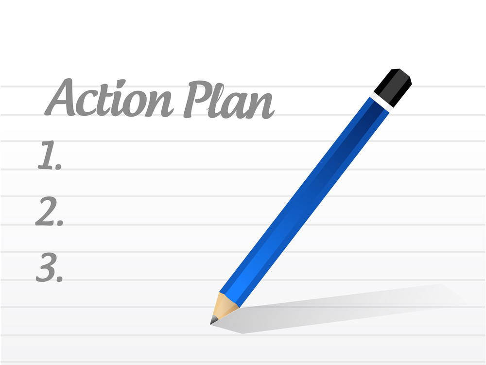 A piece of paper that says Action Plan 1, 2,3 and a pencil 