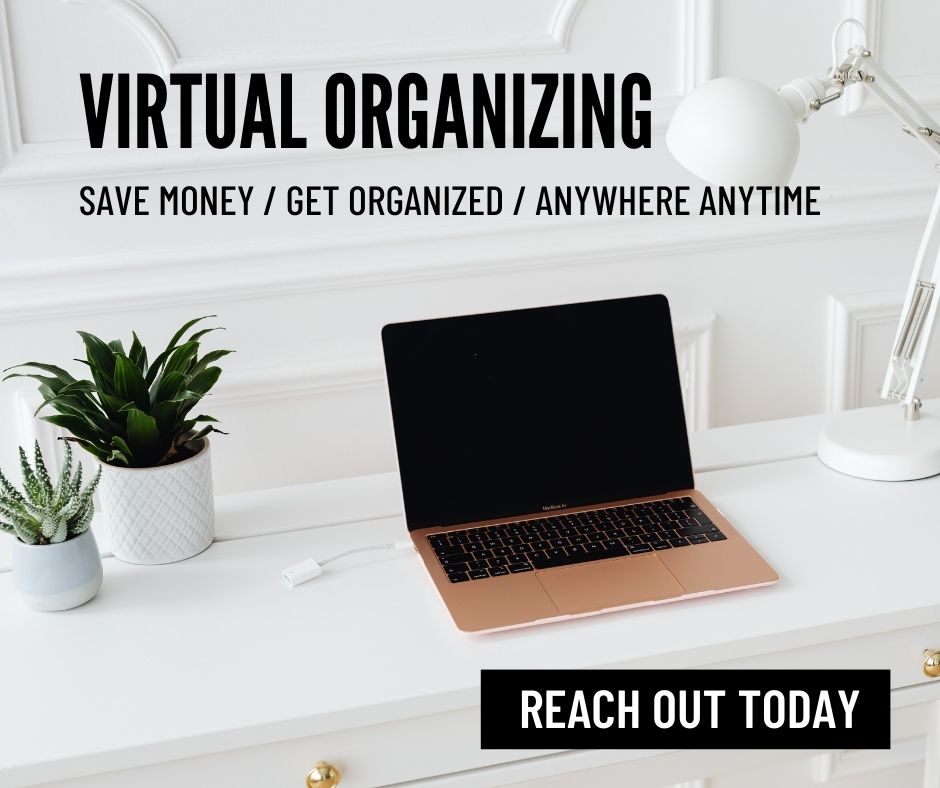 A laptop sitting on a desk open with 2 plants beside it. Virtual organizing, save money get organized anywhere anytime