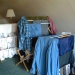 Use a rack to dry clothes and save money