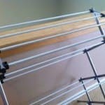 Folding wooden or wire racks can be hidden away when they are not in use under the bed or in the closet.